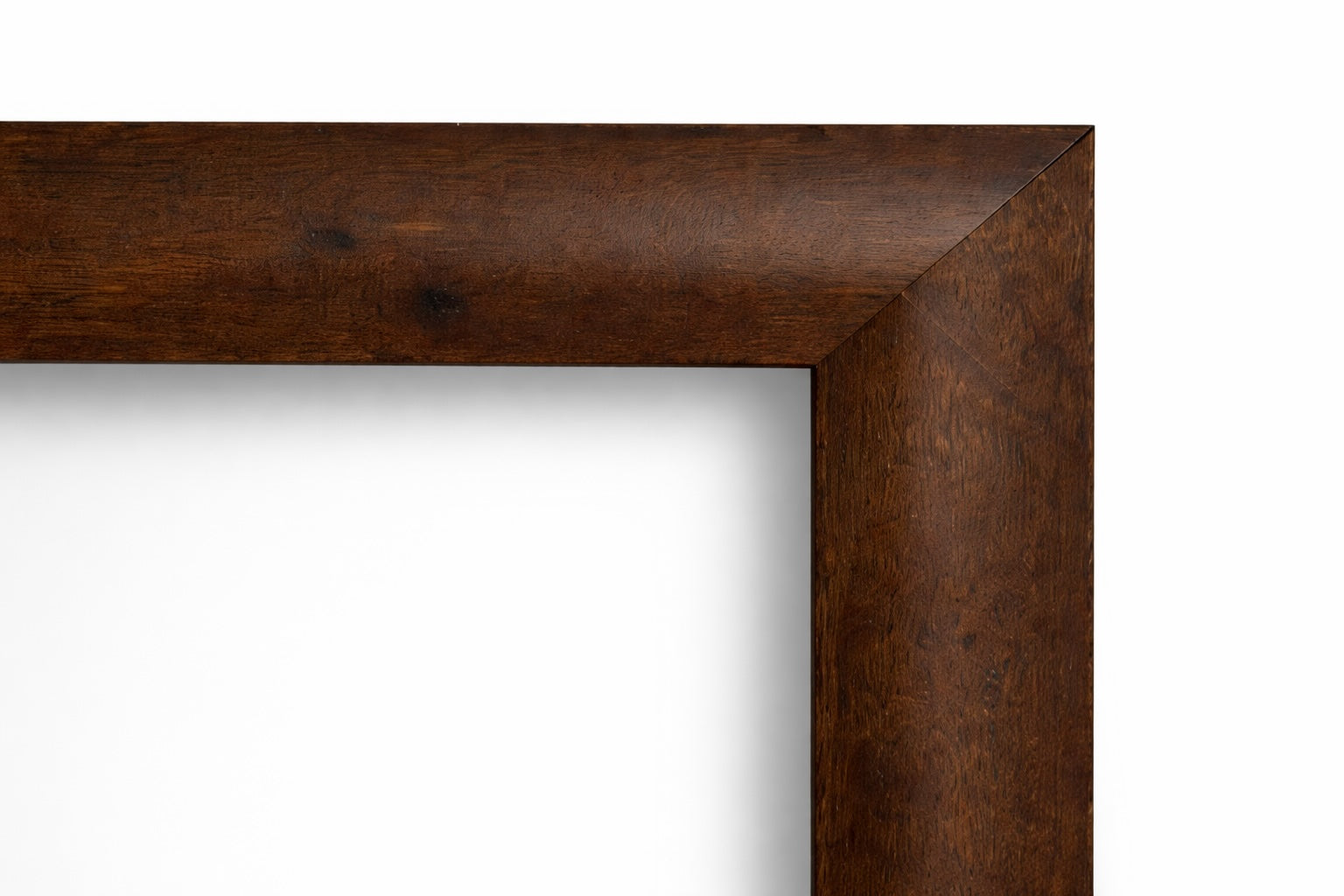 Rustic brown wood picture frame corner detail with natural grain finish