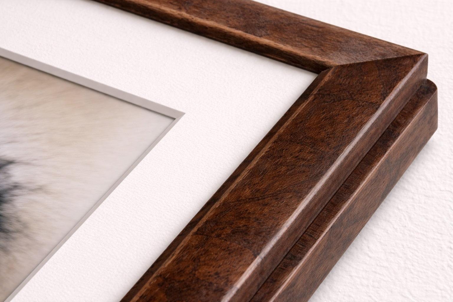 Hand-finished wood veneer frame with refined gallery profile